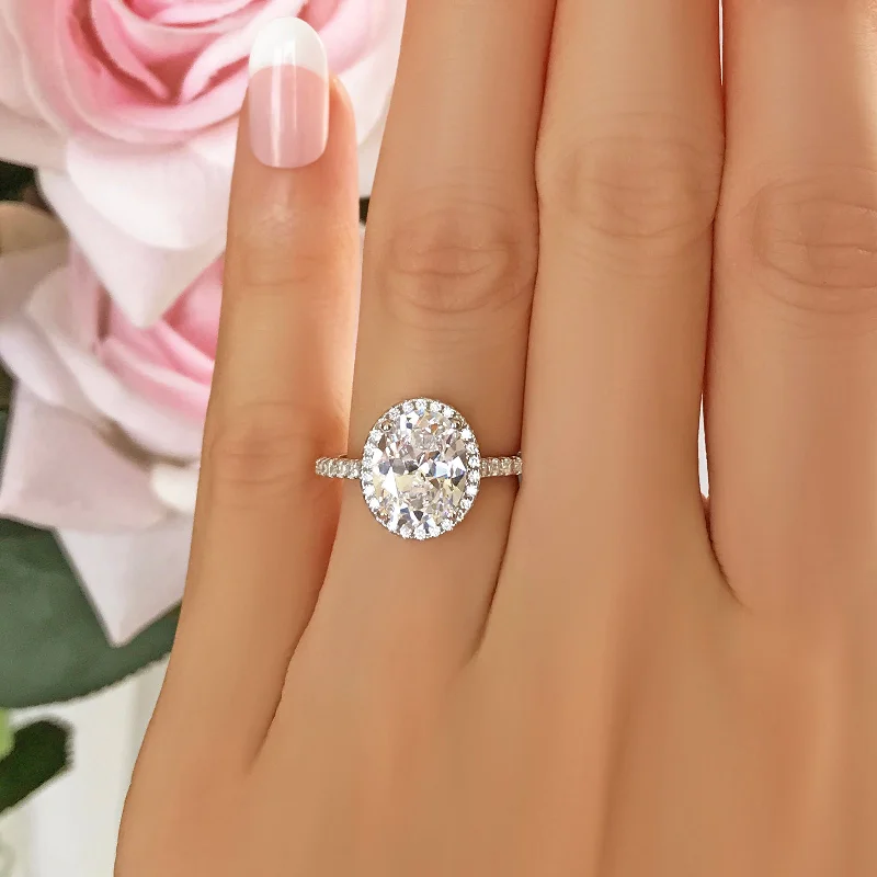 Discounted Jewelry For A Glamorous Look 3.25 ctw Oval Halo Ring